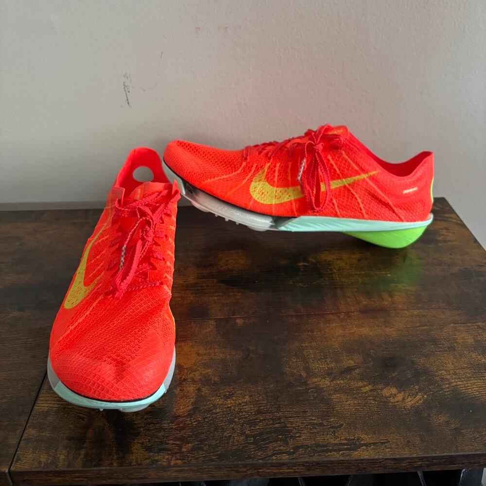 Nike victory 2 spikes bright